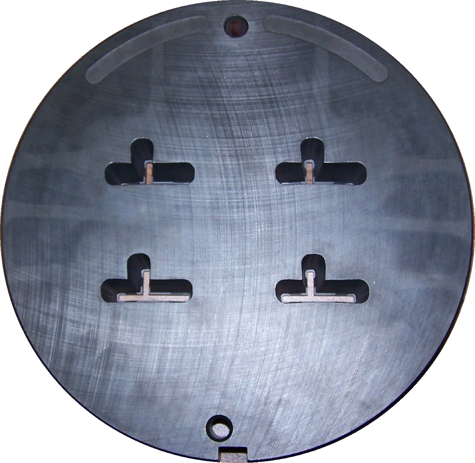 The machined steel face of an aluminium extrusion die